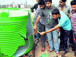 A water tank damaged by a shell fired by Pakistan in Arnia village of Jammu