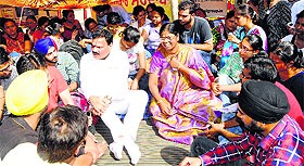 SC Commission vice-chairman Raj Kumar Verka and member PM Kamalamma with the protesting students in Amritsar on Sunday.