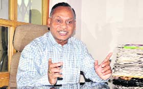Sunil Aggarwal, president of the Association of Self-Financed Institutes of Uttarakhand, addresses a press conference in Dehradun on Sunday