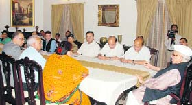 Governor Aziz Qureshi presides over a meeting at Raj Bhavan in Dehradun on Sunday