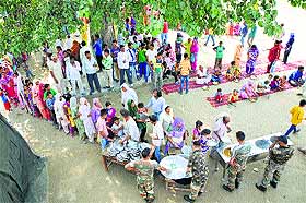Victims of Pakistani shelling being served food at a relief camp in a government school in Jammu district on Monday. 