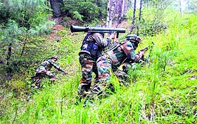 Army men during an encounter with militants in Kupwara district on Monday.