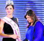 City-based Simple Kwatra being crowned Mrs India first