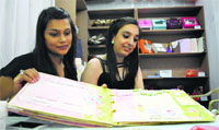 Ravneet Kaur and Gurleen Kaur show their handmade products. Tribune photo: Himanshu Mahajan