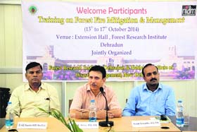 Officials of the Forest Research Institute at the inauguration of a training programme on forest fire mitigation and management in Dehradun on Monday