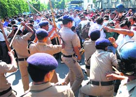 Protesting B Ed teachers being lathicharged by the police in front of the state Secretariat in Dehradun on Monday