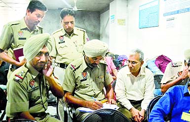 Police record the statement of Dr Rammys father at the DMCH in Ludhiana on Tuesday. 