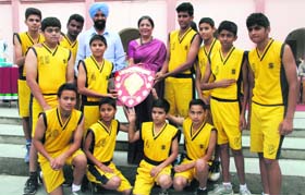 Players of the Hilton school after winning the Inter-School Council Junior Boys Basketball Tournament at The Heritage School in Dehradun on Tuesday