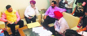 Vice-president of National SC Commission Raj Kumar Verka holds a meeting with officials in Chandigarh on Wednesday.