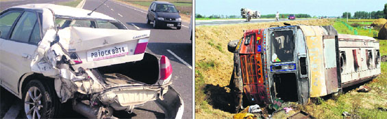 A damaged car; and (right) a truck which overturned after a head-on collision with the car on the Amritsar-Batala bypass on Wednesday.