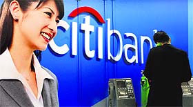 A man makes a phone call in front of a Citibank advertisement in Tokyo. Citigroup Inc said it is pulling out of consumer banking in 11 markets, including Japan and Egypt, as the US bank with the biggest international business looks to cut persistently high costs. 