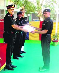 Brigadier RK Rana honours a former EME personnel during the 71th Corps Day of the Corps of Electronics and Mechanical Engineers in Bathinda on Wednesday