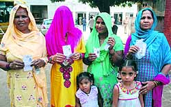 Members of a family after casting their vote at a polling station in Sector 17, Panchkula, on Wednesday
