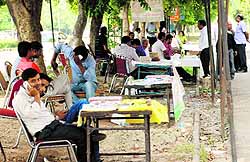 Counters of polling agents of different parties wear a deserted look outside a polling booth in Sector 6, Panchkula