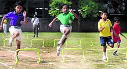 Students take part in a hurdle race during the Third Annual Athletics Meet at The Tribune School in Sector 29, Chandigarh. Principal Vandana Saxena inaugurated the meet on Wednesday with the motto: Be the best, you can be