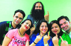 Dera Sacha Sauda chief Gurmeet Ram Rahim Singh with his three daughters and two sons-in-law after they cast their votes in Sirsa on Wednesday. A Tribune photograph