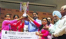 Winners of the Inter-College Biz Quiz competition with their prizes at GNA University on Wednesday