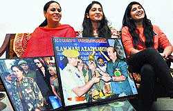 Family members of Shakti Devi, who won the international female peacekeeper award, in jubilant mood in Jammu on Wednesday