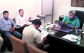 ADC Amrit Kaur Gill with the representatives of political parties in Ludhiana. 