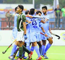 Indian players celebrate a goal during their match against Pakistan in the Sultan of Johor Cup on Wednesday.