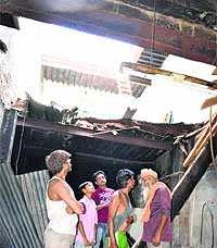 A family had a narrow escape when a portion of a house collapsed near Quila Bhangia in the walled city area on Wednesday night