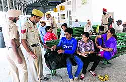 Security personnel carry out checks at the railway station in Bathinda on Thursday
