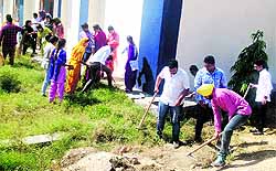 Students take part in a cleanliness drive as part of the NSS camp organised at Guru Kashi University in Talwandi Sabo on Thursday