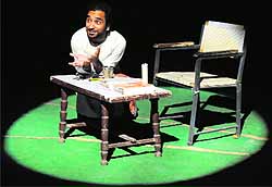 An artiste enacts a scene from the play "Khetan Da Putt" at Balwant Gargi Open Air Theatre in Bathinda on Thursday