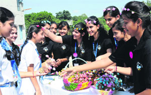 Students of Sacred Heart Senior Secondary School take part in an event on the campus in Sector 26, Chandigarh, on Thursday