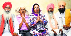 Parents of Supriya along with members of Sant Samaj address the media in Jalandhar on Thursday