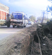 A damaged portion of the national highway in Pampore. A Tribune photograph