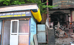 The flood-hit lower court on the banks of the Jhelum in Srinagar. Tribune photo: Amin War