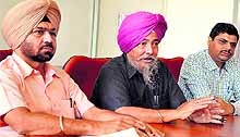 HS Gosal (centre), director and convener of the PU Regional Centre, addresses mediapersons