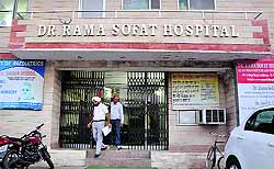 Dr Maninder Singh, District Family Welfare Officer, comes out of Dr Rama Sofat Hospital after sealing the machines