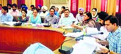 DC Rajat Aggarwal addresses the monthly review meeting of officers in Ludhiana on Thursday