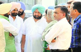 Former CMs Capt Amarinder Singh and Rajinder Kaur Bhattal outside Congress Bhawan