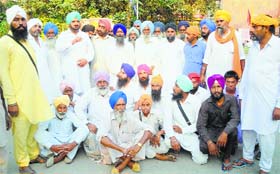 Followers of BS Daduwal outside the DCs office in Bathinda on Thursday