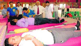 Students of College of Engineering donate blood at a blood donation camp on the college premises in Roorkee on Thursday.