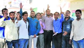 Members of DAV PG College Students Union protest at the Chief Medical Officers office in Dehradun on Thursday.