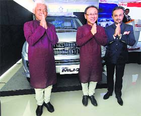 Shigeru Wakabayashi, deputy MD, Isuzu Motors with Takashi Kikuchi, MD, at the launch of MU7 SUV, in Noida on Friday.