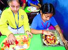 Students of Ryan International School observe World Food Day in Ludhiana on Friday