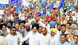 Protesters outside the Mini-Secretariat in Ludhiana on Friday