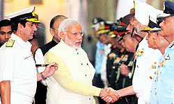 Prime Minister Narendra Modi being introduced to top military commanders in New Delhi on Friday