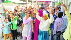 Residents protest over damage caused to their houses due to an explosion at a shopping mall at Sriganganagar.