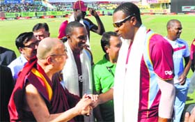 The Dalai Lama meeting the West Indian players.