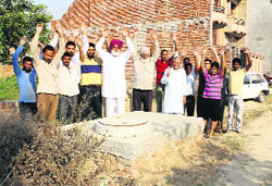 Residents of National Colony raise slogans over the lack of basic facilities in their locality in Bathinda on Saturday. Photo: Vijay Kumar
