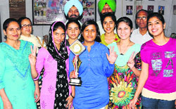 Winners of the girls chess team celebrate their victory with the teachers of Government Rajindra College in the Inter-College Competiton held at National College Sanghol (Ropar), in Bathinda on Saturday. Tribune photo