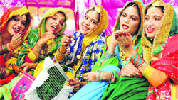 Girls perform during a folk song competition during the Panjab University Zonal Youth and Heritage Festival - 2014 at SGGS College, Sector 26, in Chandigarh on Saturday. Tribune photo: Manoj Mahajan