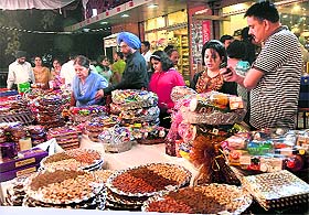 A vendor sells dry fruits ahead of Diwali in Jalandhar on Saturday. 