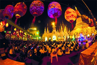 Buddhist devotees pray at Myanmar’s landmark Shwedagon Pagoda during the eve of the full moon day of Thadingyut, the lighting festival to mark the end of Buddhist Lent, in Yangon, Myanmar.